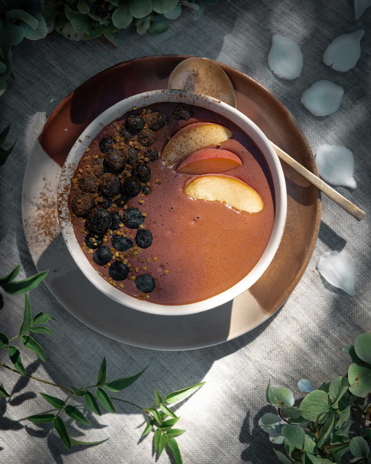 Cacao smoothie bowl with fruit toppings